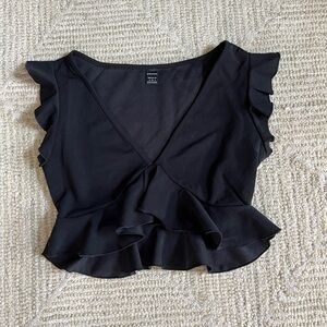 Shein black ruffle top. never worn. super cute